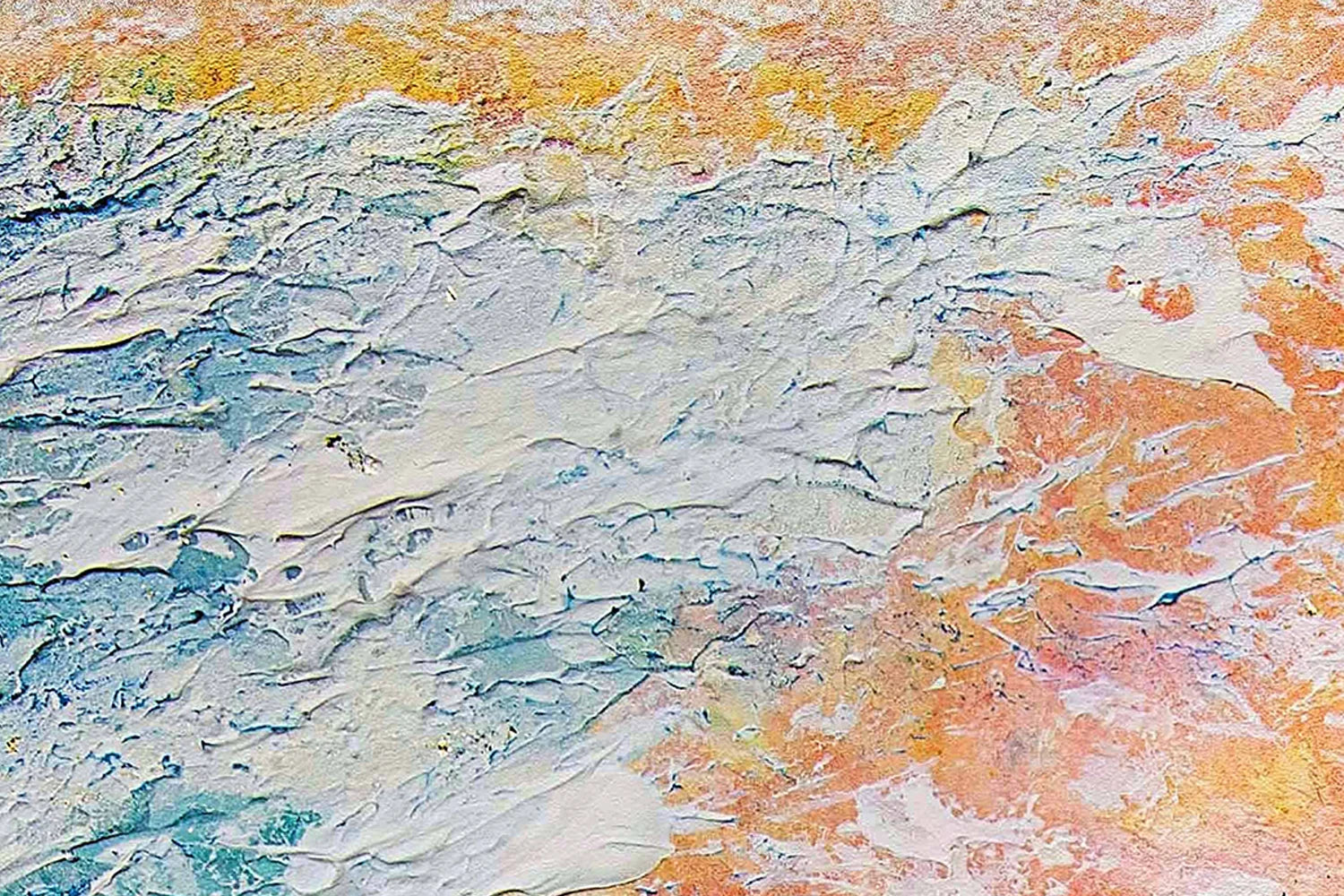 Hue the Artist mixed media artwork close up of paint textures in yellow, orange with wave like pattern in blue and white.